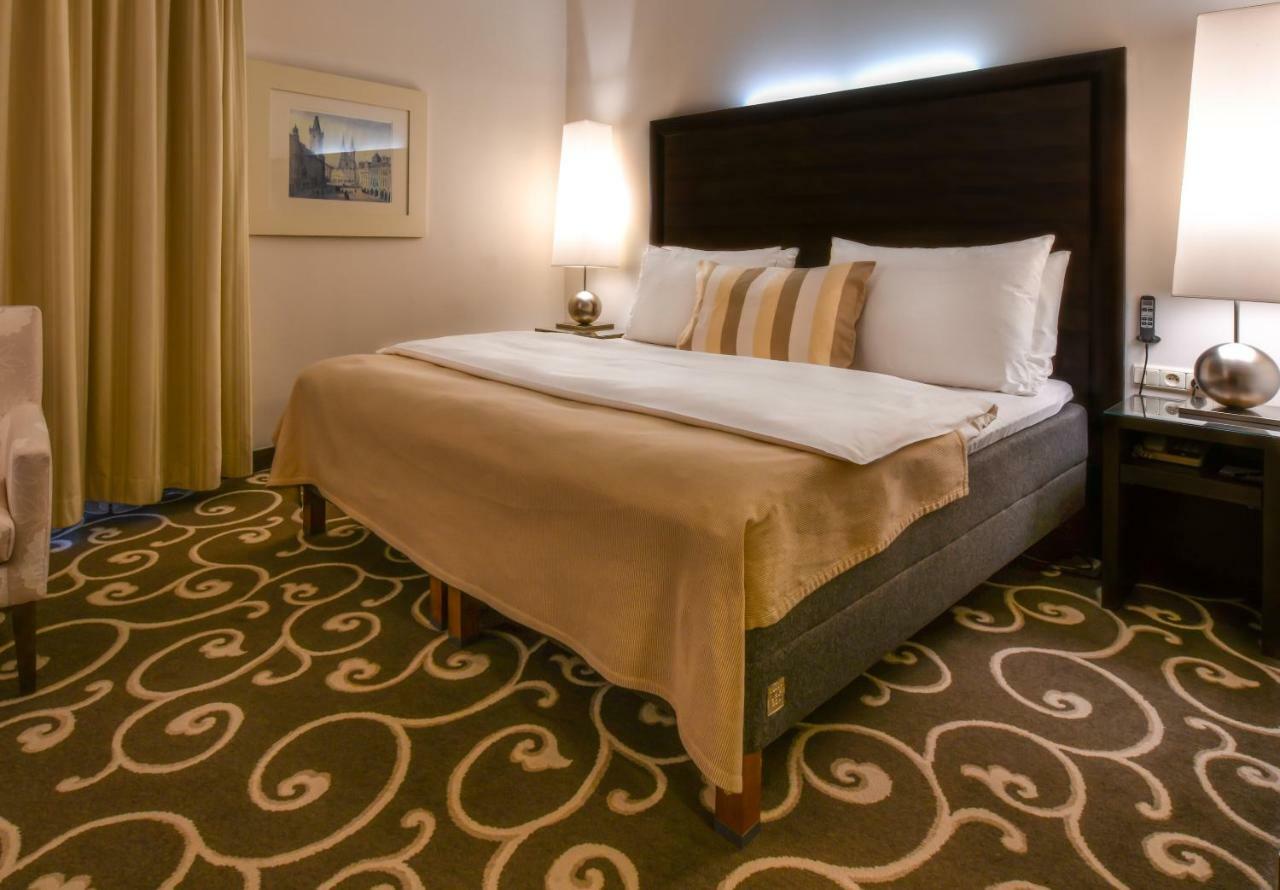 Grand Hotel Bohemia Praag Buitenkant foto A room at the hotel